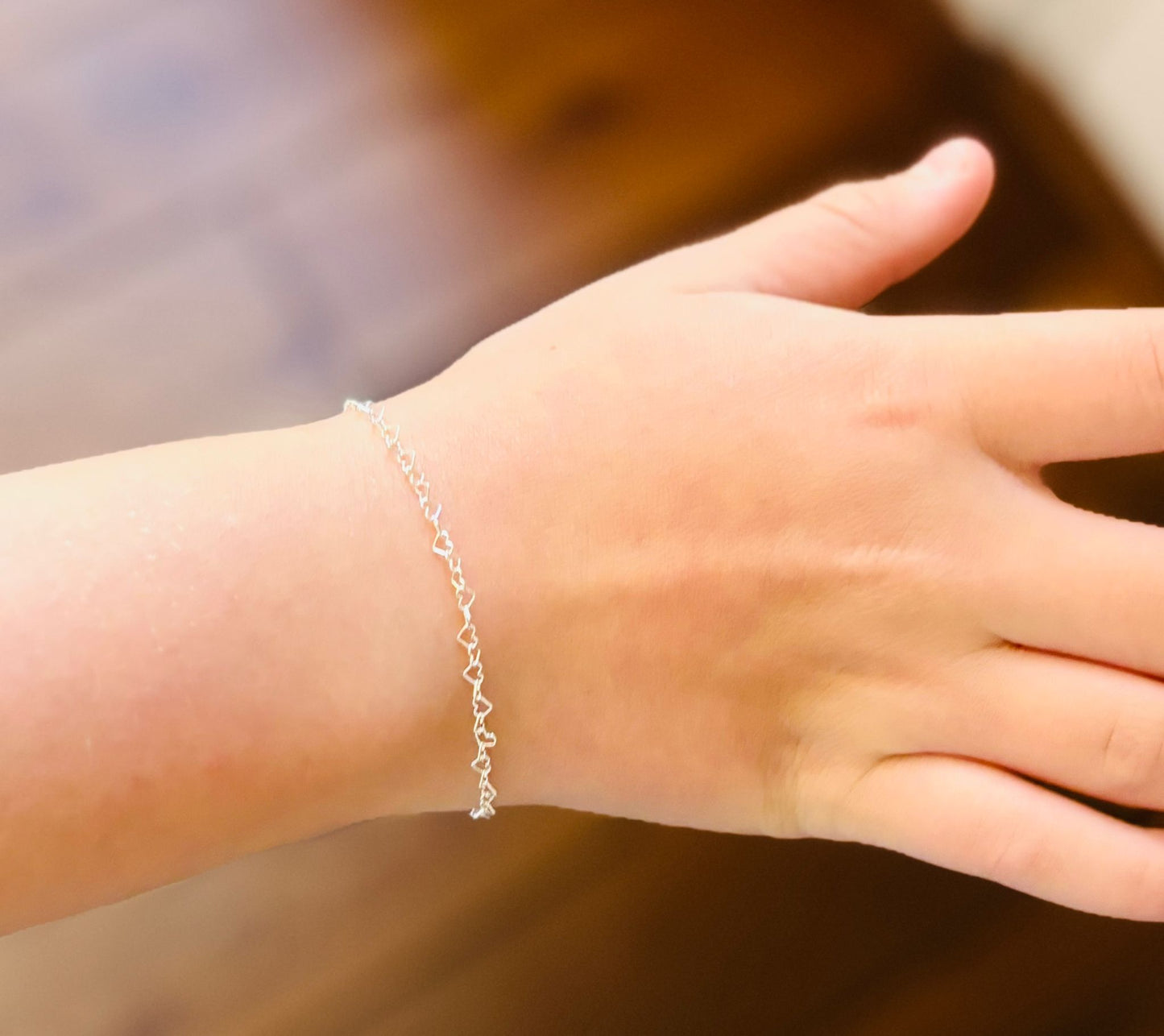 Zilveren hartjes schakel armbandje