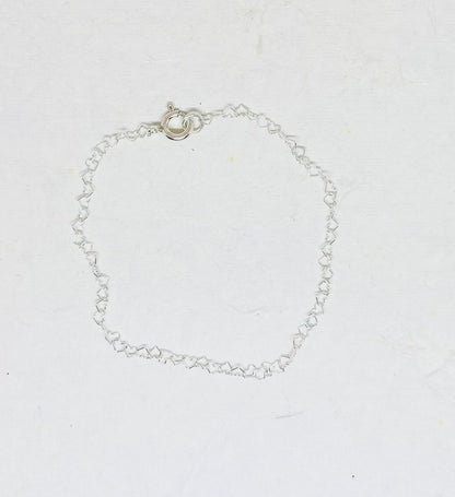 Zilveren hartjes schakel armbandje