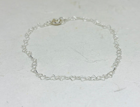 Zilveren hartjes schakel armbandje