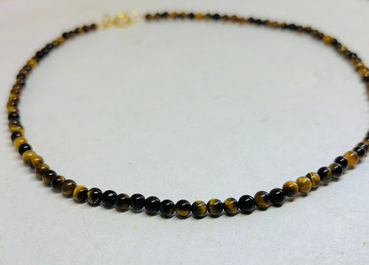 Ketting tijgeroog met goudkleurig slotje